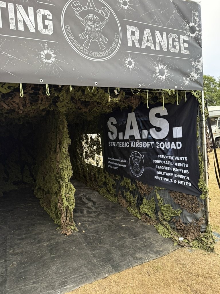The S.A.S. Strategic Airsoft Squad banner on the side of the range