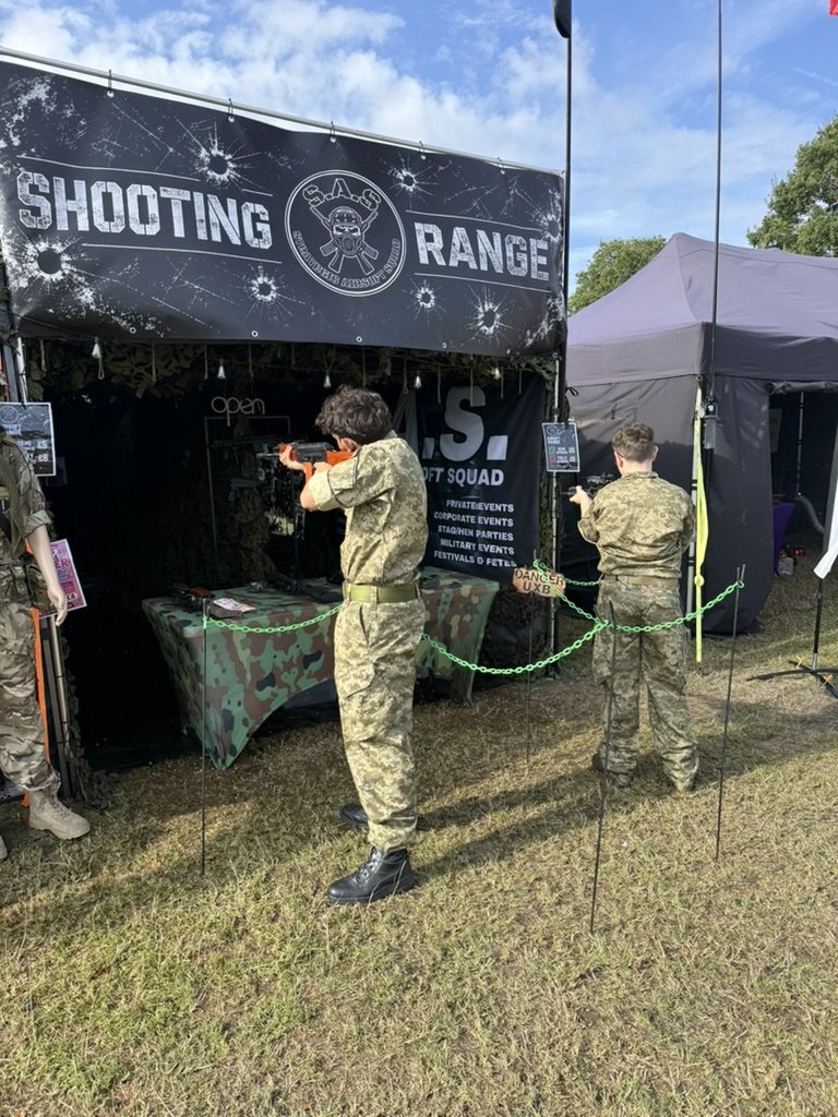 Two people taking turns on the range